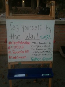 Source Credit: SJP Cal State Fullerton Palestinian Mock Apartheid Wall Event 2014 Photo Album, Dec 4 2014