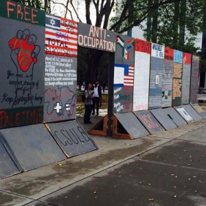 Source Credit: SJP Cal State Fullerton Palestinian Mock Apartheid Wall Event 2014 Photo Album, Dec 4 2014
