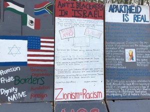 Source Credit: SJP Cal State Fullerton Palestinian Mock Apartheid Wall Event 2014 Photo Album, Dec 4 2014