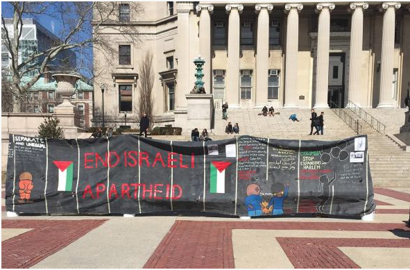 Source Credit: A wall, mocking Israel’s security barrier, erected at Columbia University to mark Israel Apartheid Week.