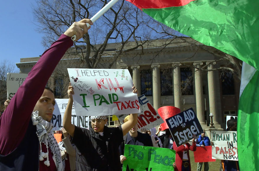 Source Credit: Students at the University of Minnesota waving a Palestinian flag during a protest at the school’s Minneapolis campus. (AP/Ann Heisenfelt) (January 14, 2016)