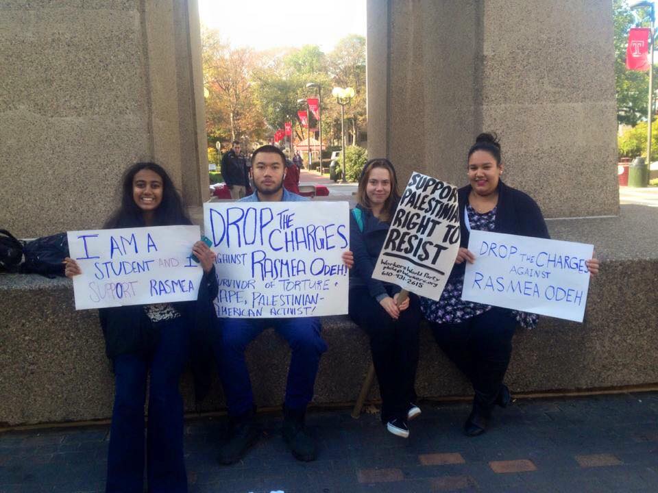 Source Credit: Four temple SJP members held up signs in support of convicted terrorist, Rasmea Odeh. (January 27, 2016)