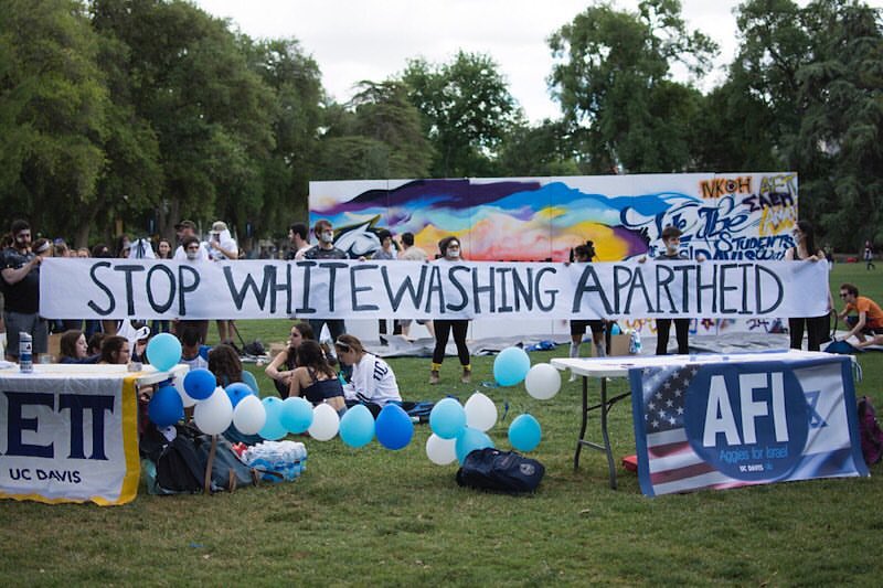 SJP & JVP students protest the Artists 4 Israel Graffiti Art show hosted by campus Jewish societies. Source Credit: California Aggie (May 20, 2016)